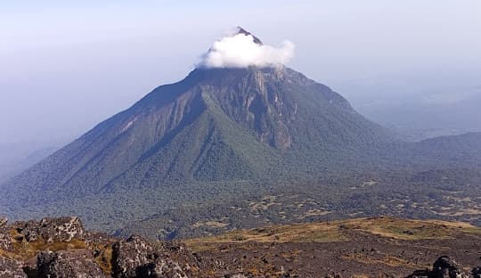 Bisoke crater lake trek forest trail Volcanoes Park Rwanda