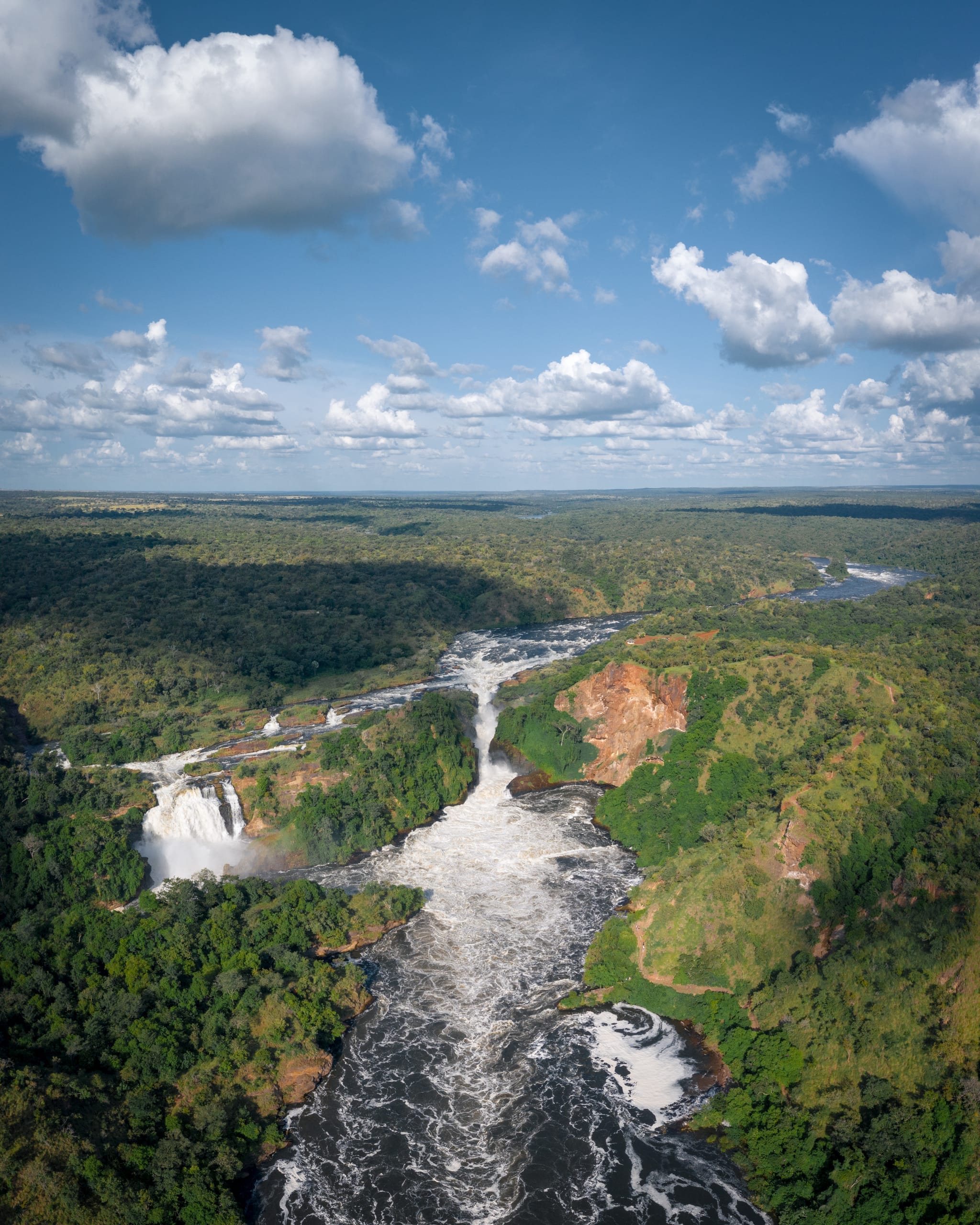 An aerial view of Murchison Falls and the Nile flowing through Uganda