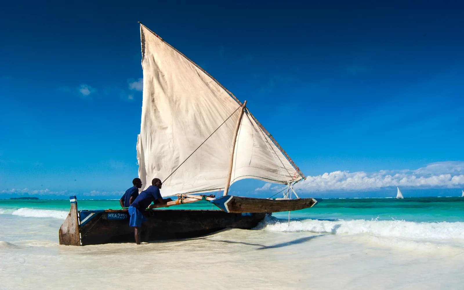 Traditional sailing boat on the turquoise Zanzibar coast